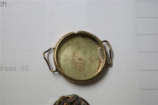 A ladys gold Rolex Precision watch and two other watches.